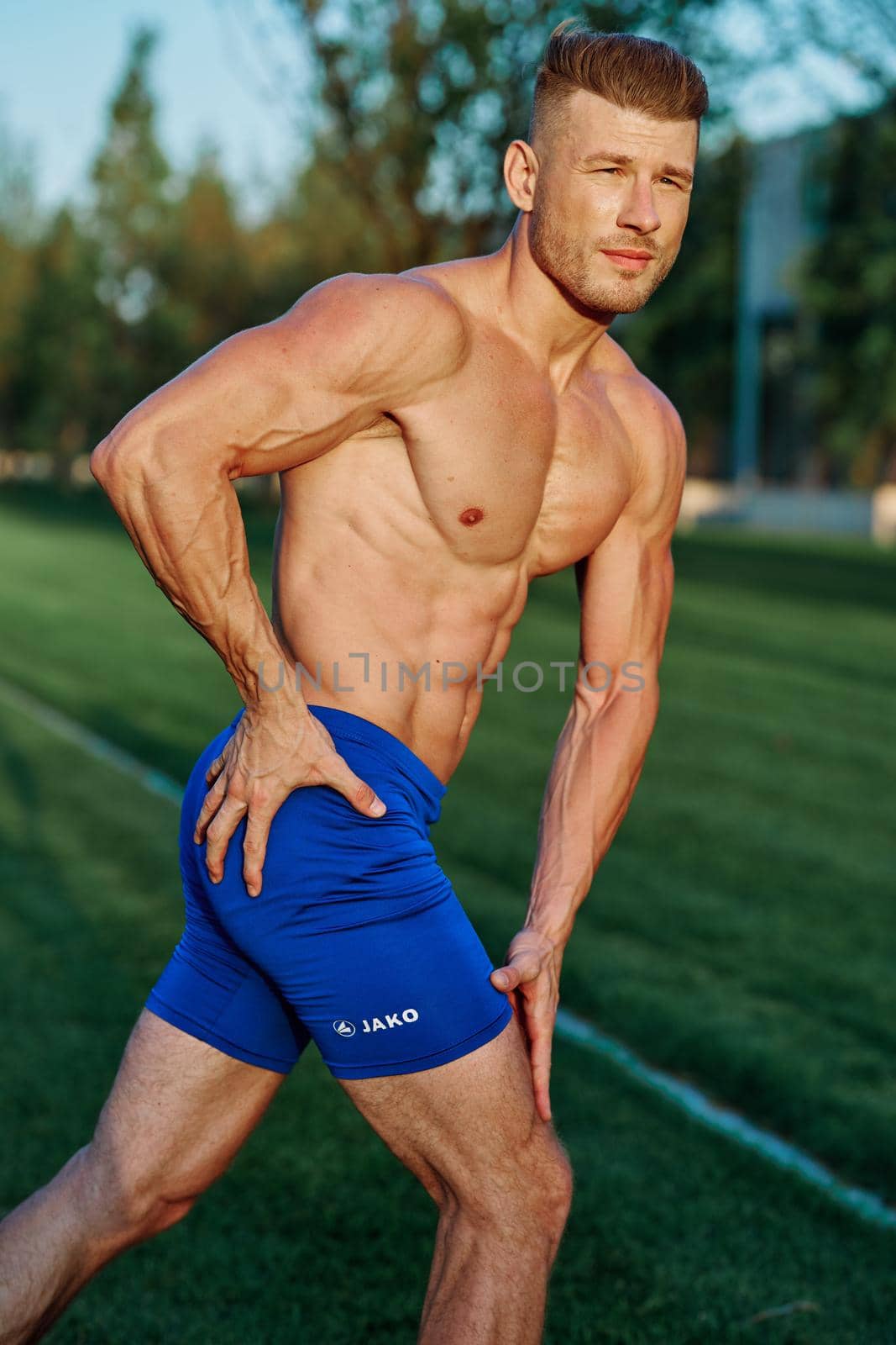 man in the park workout outdoor exercise by Vichizh