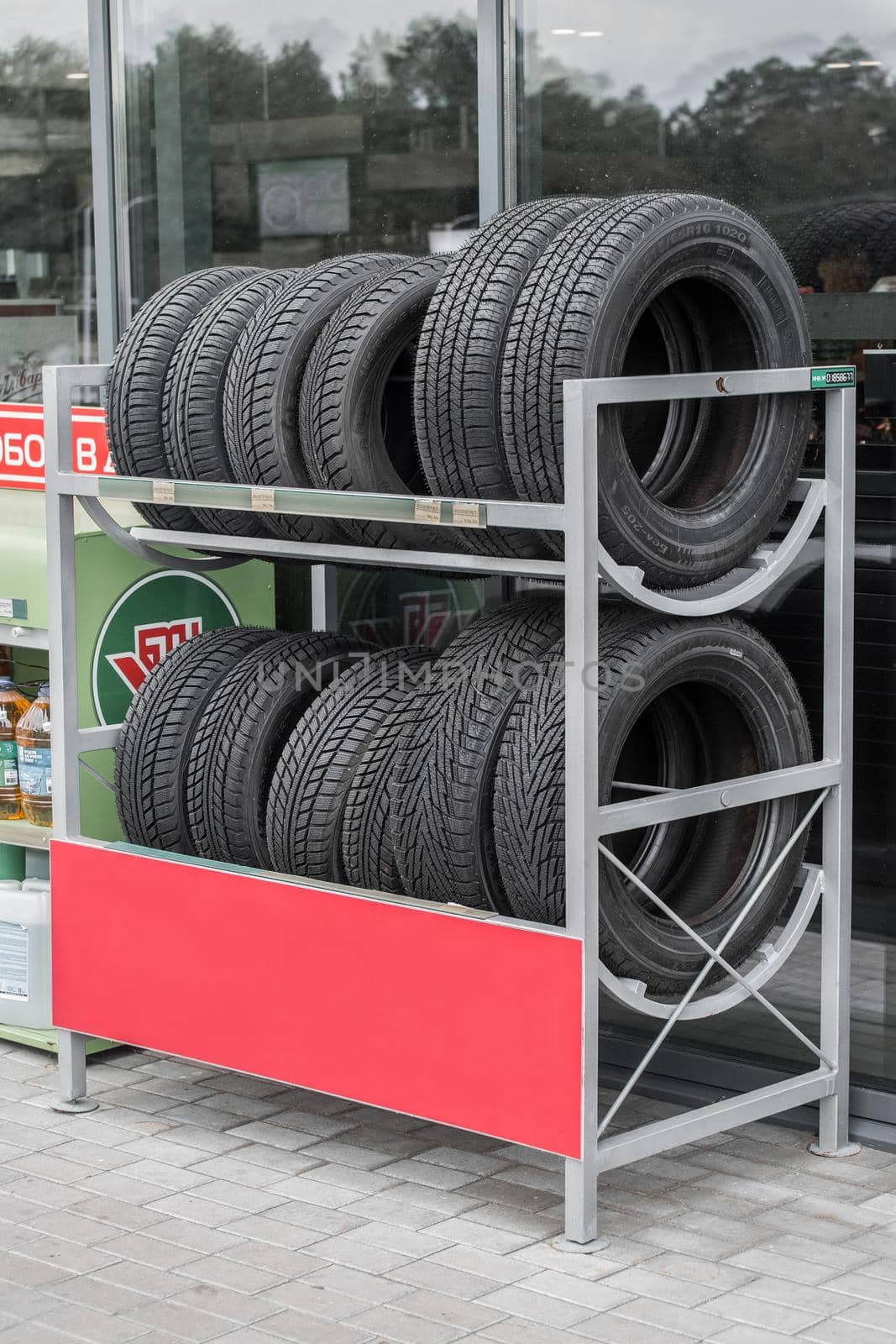 Belarus, Gomel region - August 21, 2020: Car tires for the vehicle are stored for sale at the gas station by AYDO8