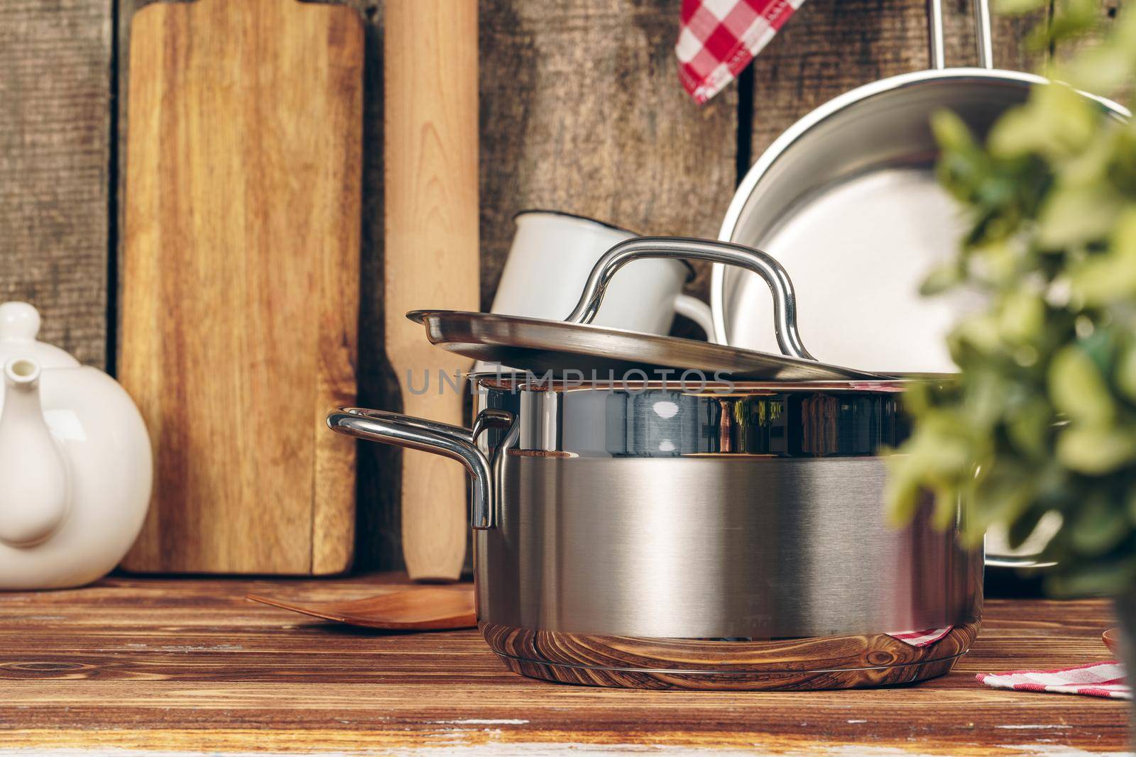 Set of cookware utensils on a kitchen counter. Close up.