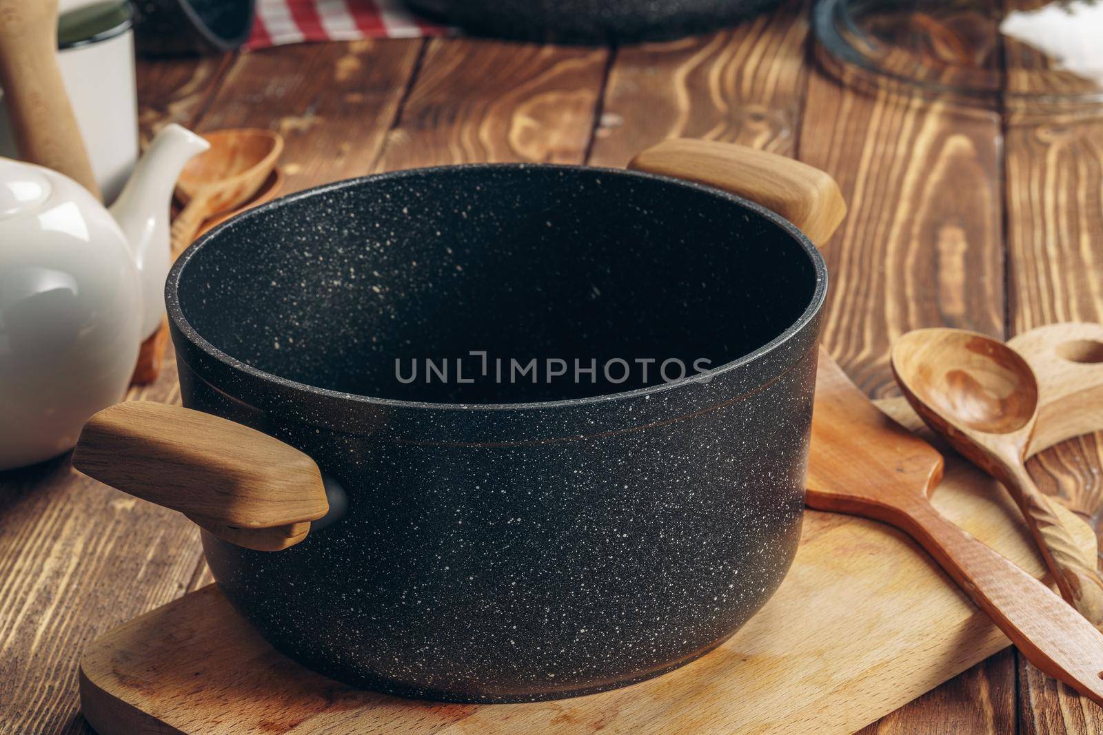 Set of cookware utensils on a kitchen counter. Close up.