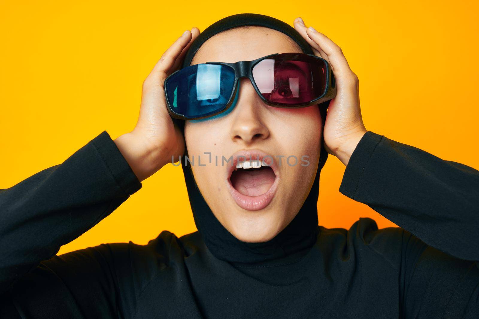 pretty woman watching movies 3D glasses fun ethnicity model. High quality photo