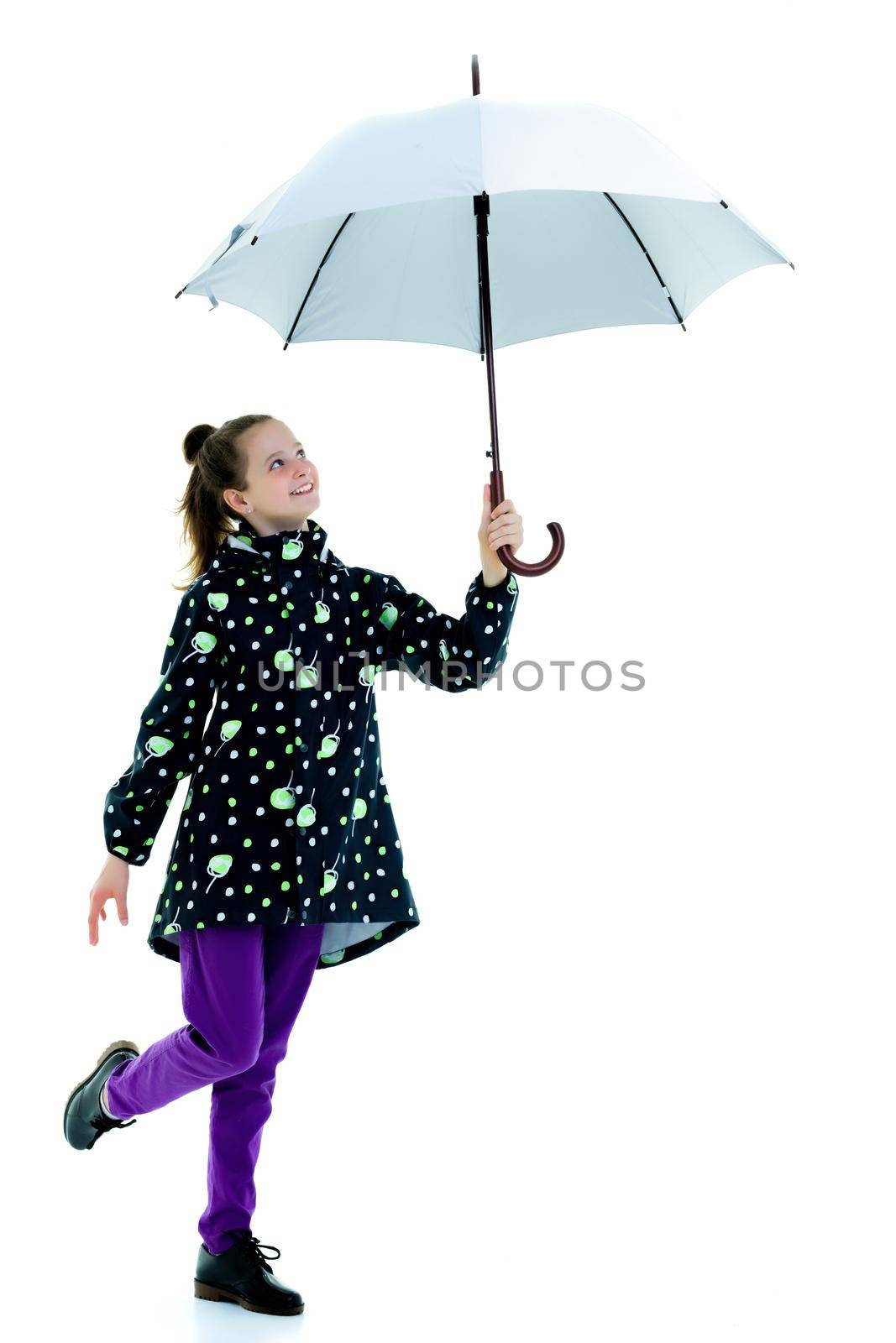 Beautiful little girl with umbrella. Concept of weather, climate change. Isolated on white background