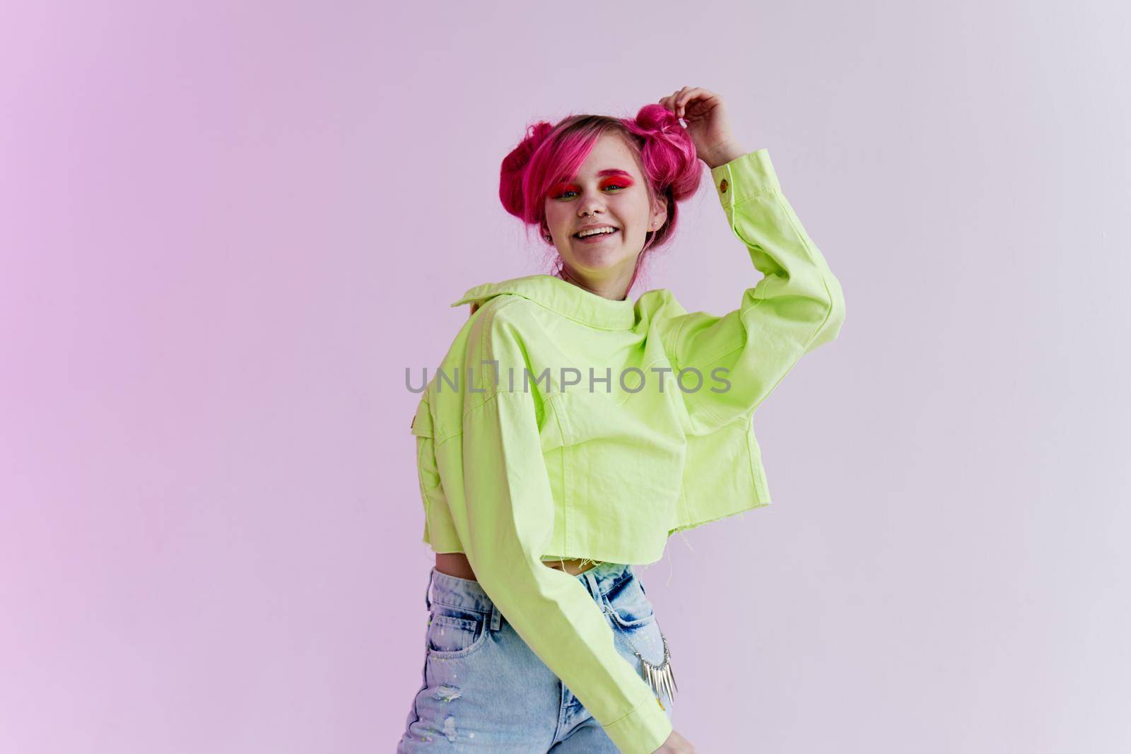 cheerful woman bright cosmetics party posing neon background. High quality photo