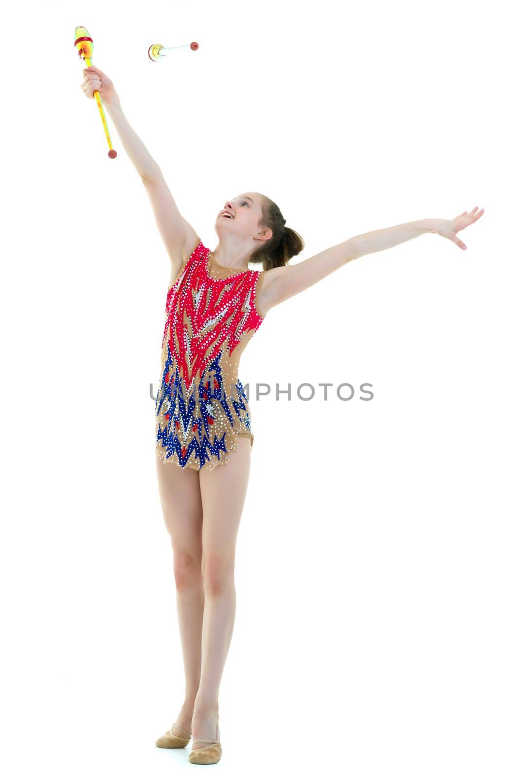 A girl gymnast performs exercises with a mace. by kolesnikov_studio
