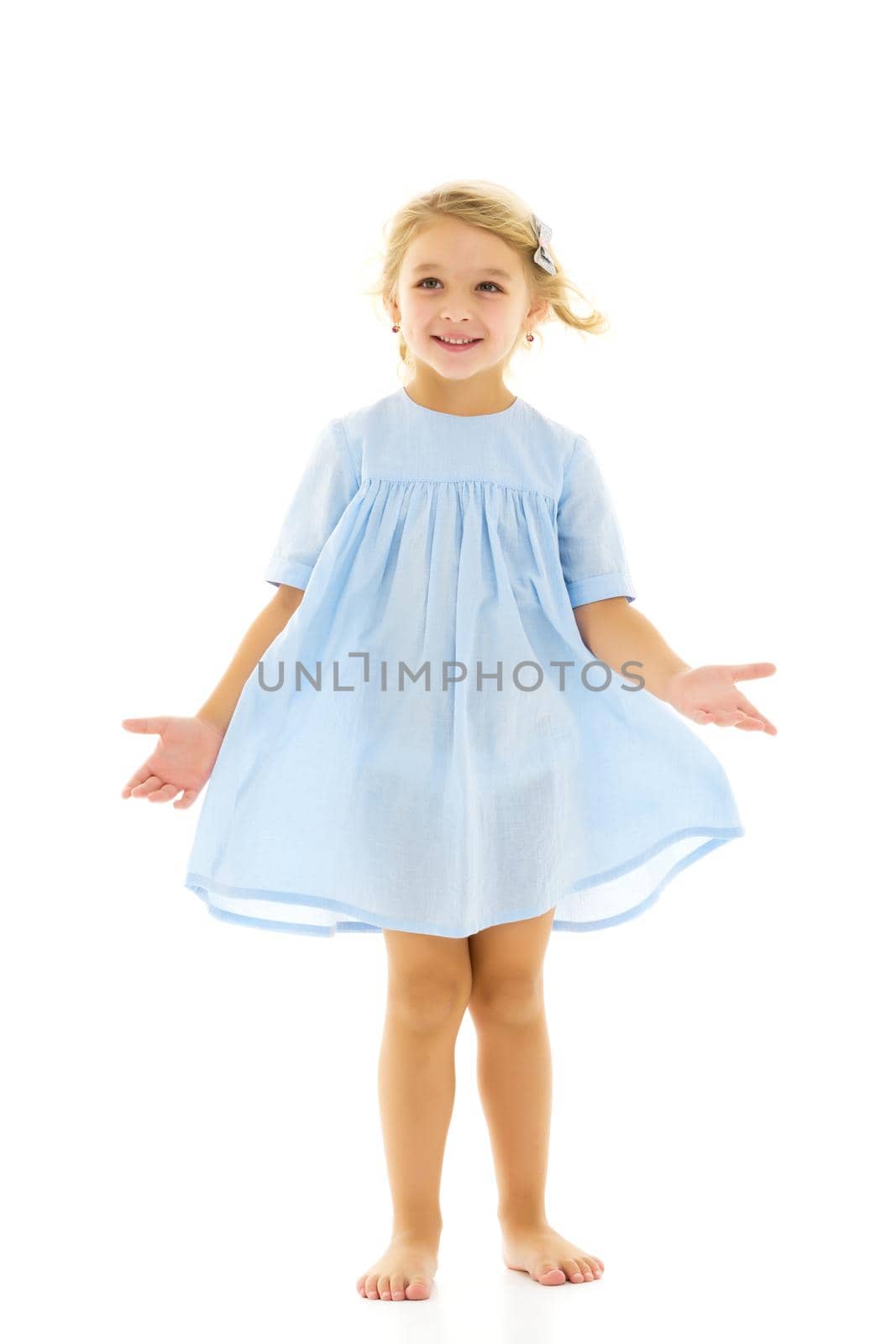 Little girl in an elegant dress.The concept of a happy childhood, healthy lifestyle. by kolesnikov_studio