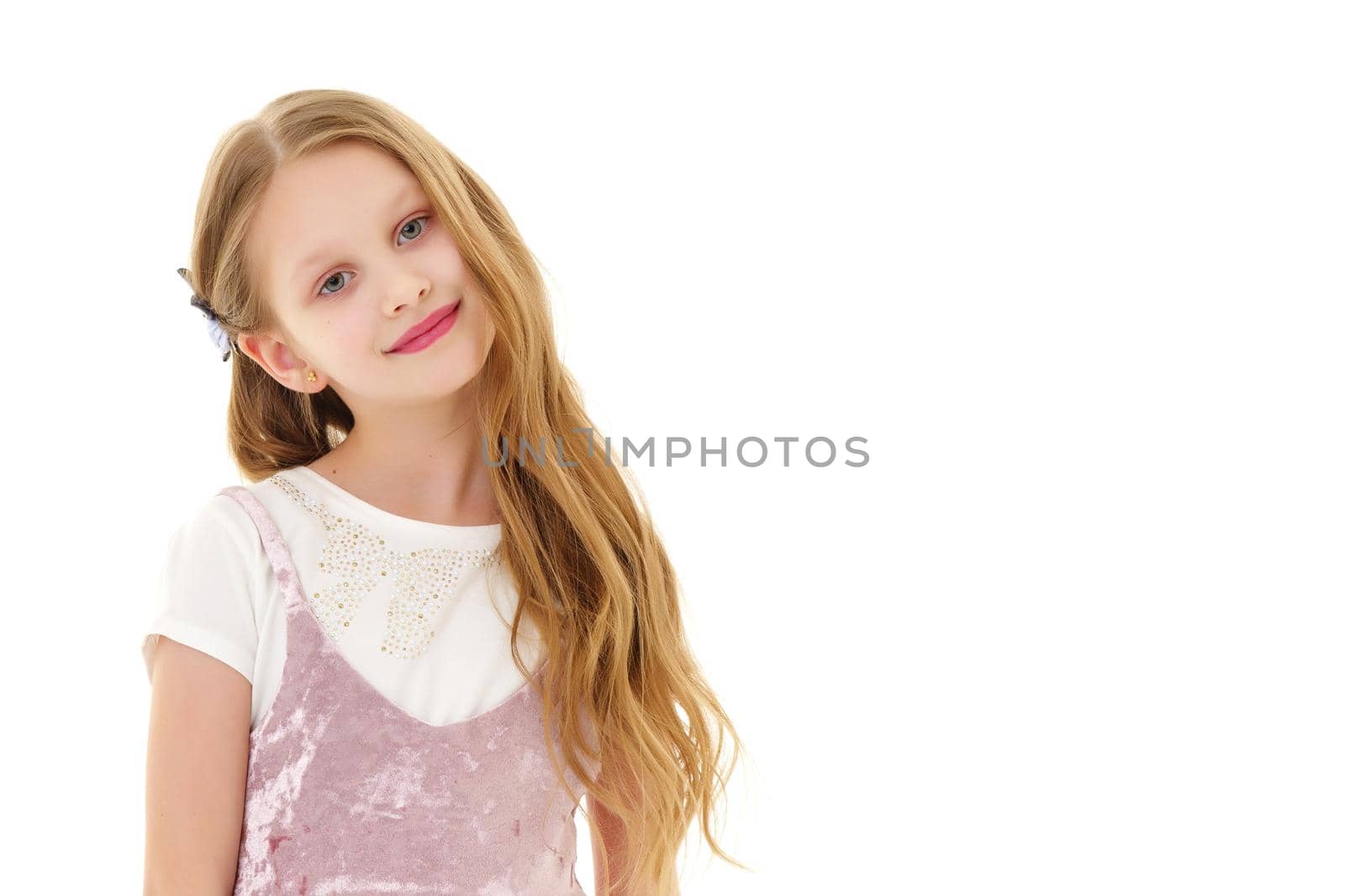 Beautiful little girl in an elegant dress in full growth. by kolesnikov_studio