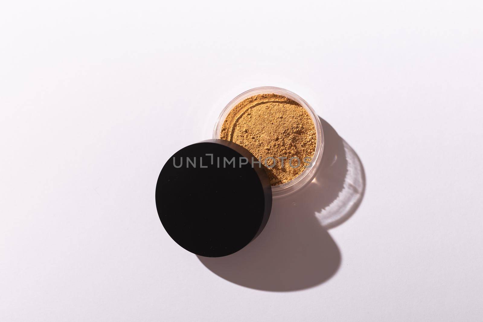Mineral powder foundation isolated on a white background. Eco-friendly and organic beauty products by Satura86