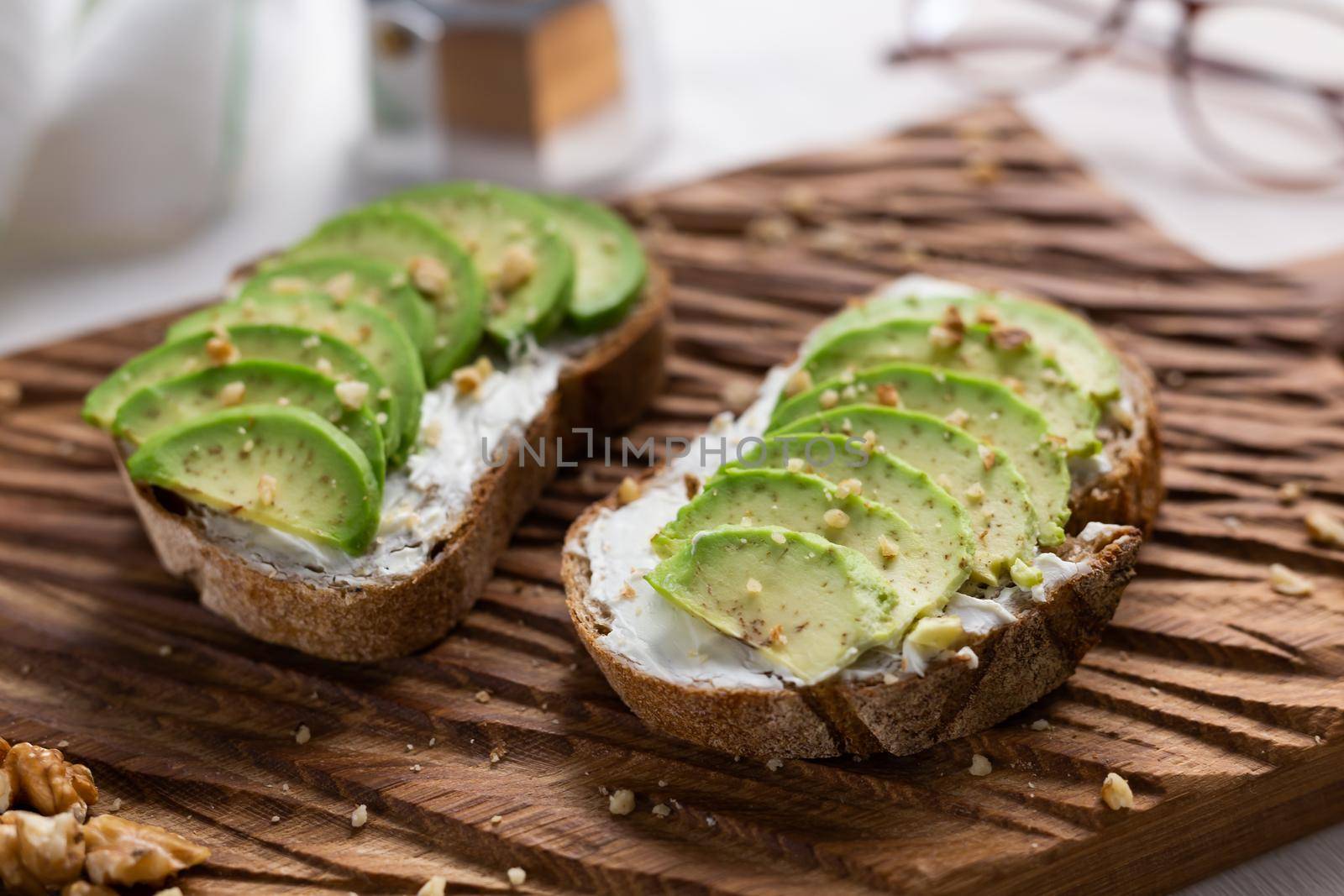 sliced avocado on toast bread with spices.