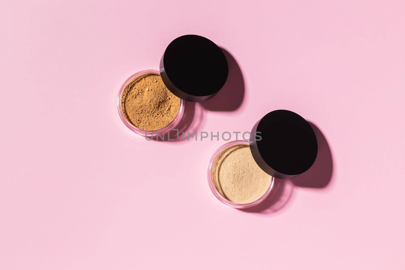 Mineral powder foundation isolated on a white background. Eco-friendly and organic beauty products.