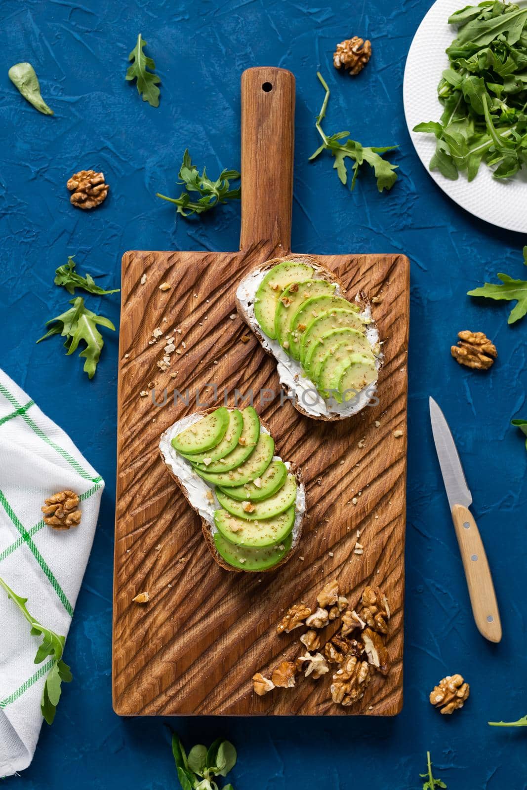 sliced avocado on toast bread with spices.