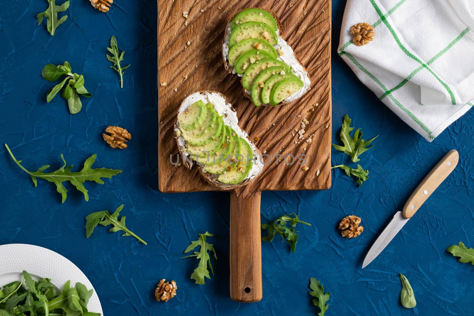 sliced avocado on toast bread with spices.