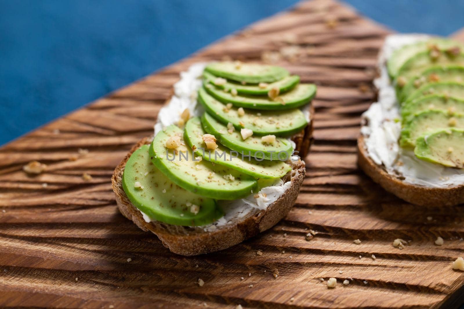 sliced avocado on toast bread with spices.