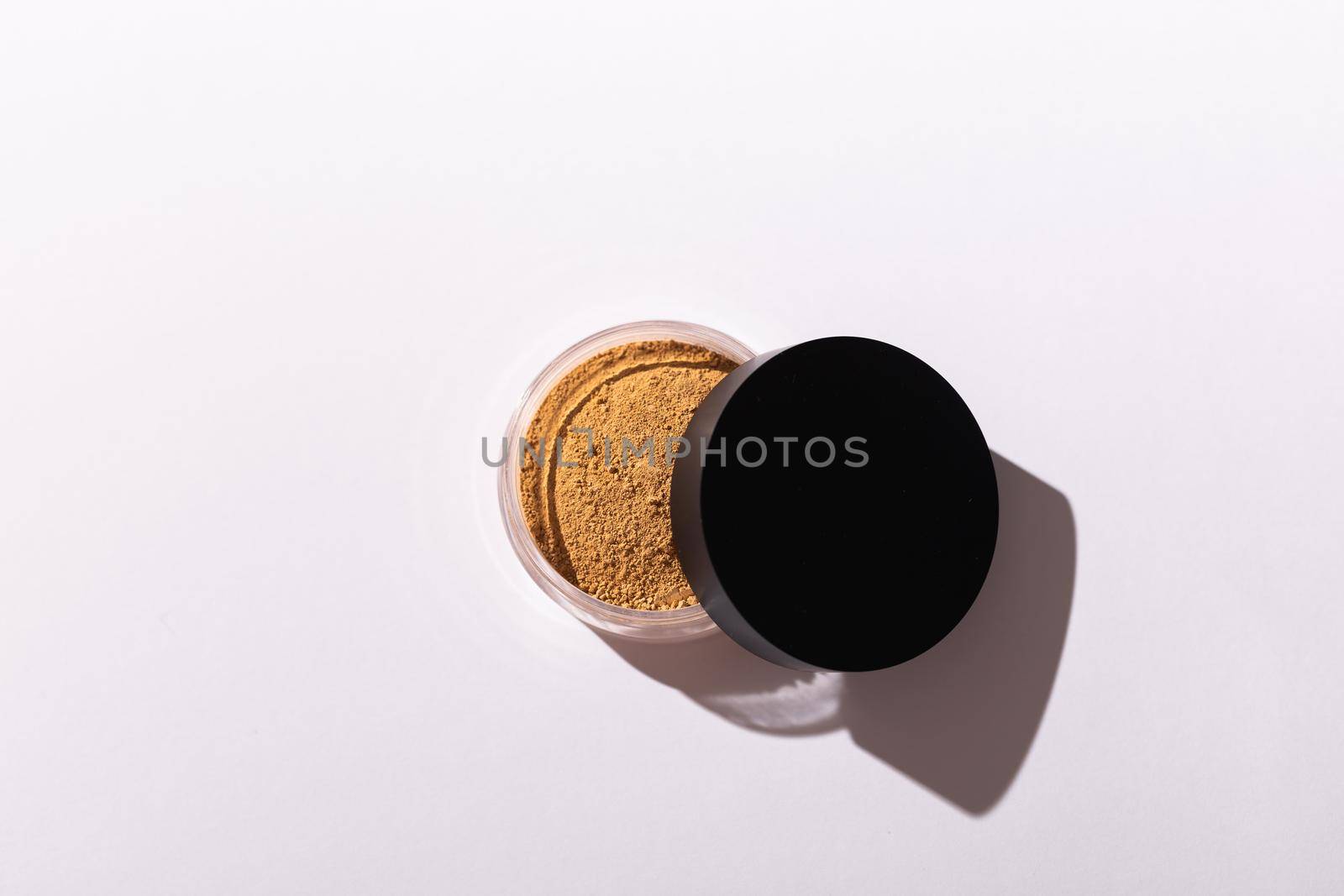 Mineral powder foundation isolated on a white background. Eco-friendly and organic beauty products by Satura86