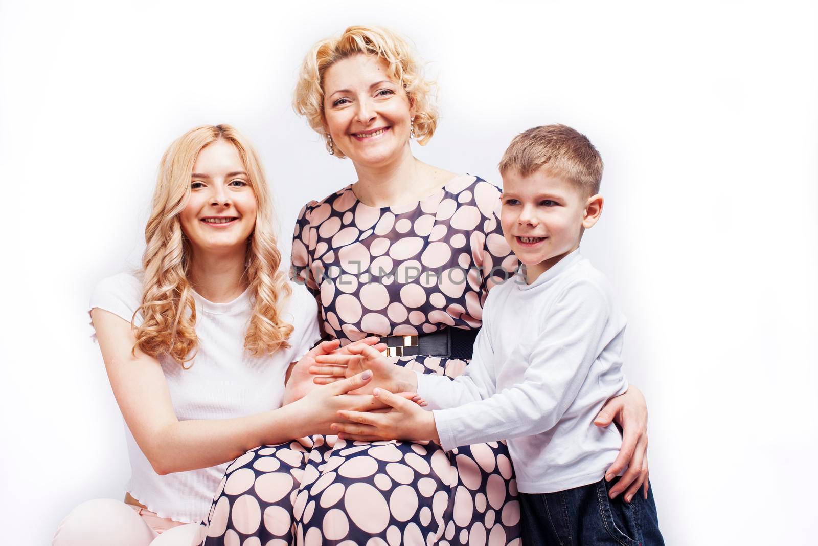 happy smiling blond family together posing cheerful on white background, generation concept. lifestyle people by JordanJ