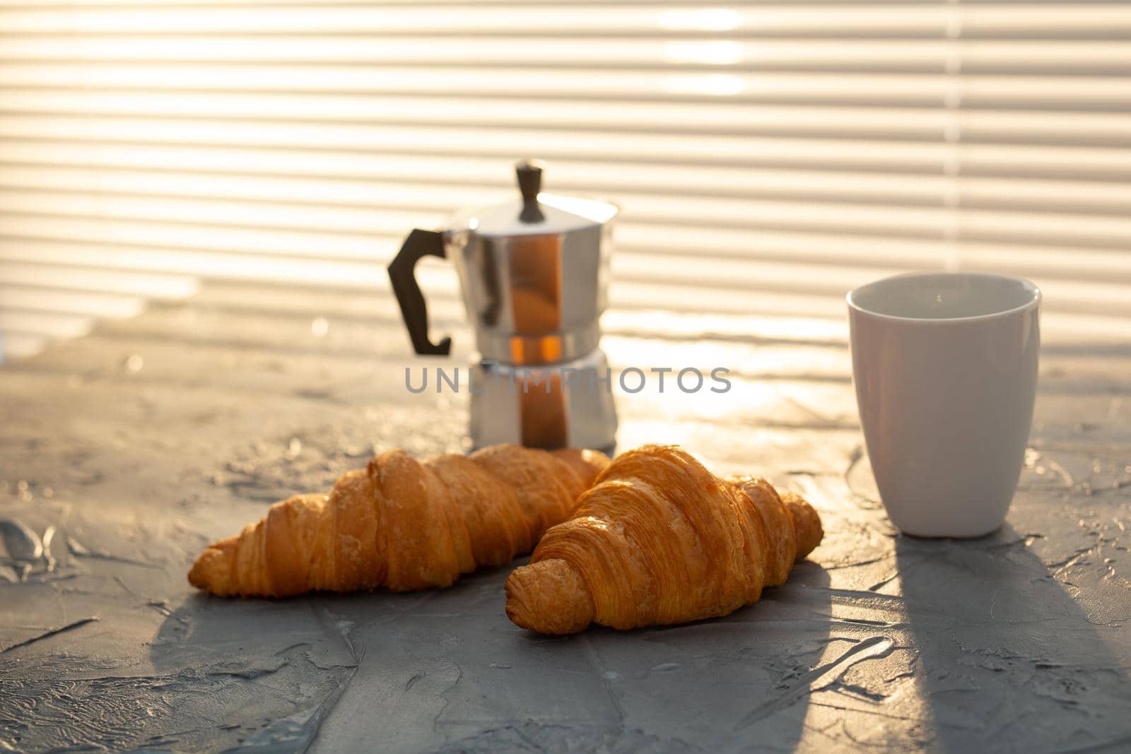 Breakfast with croissant and moka pot. Morning meal and breakfast concept. by Satura86