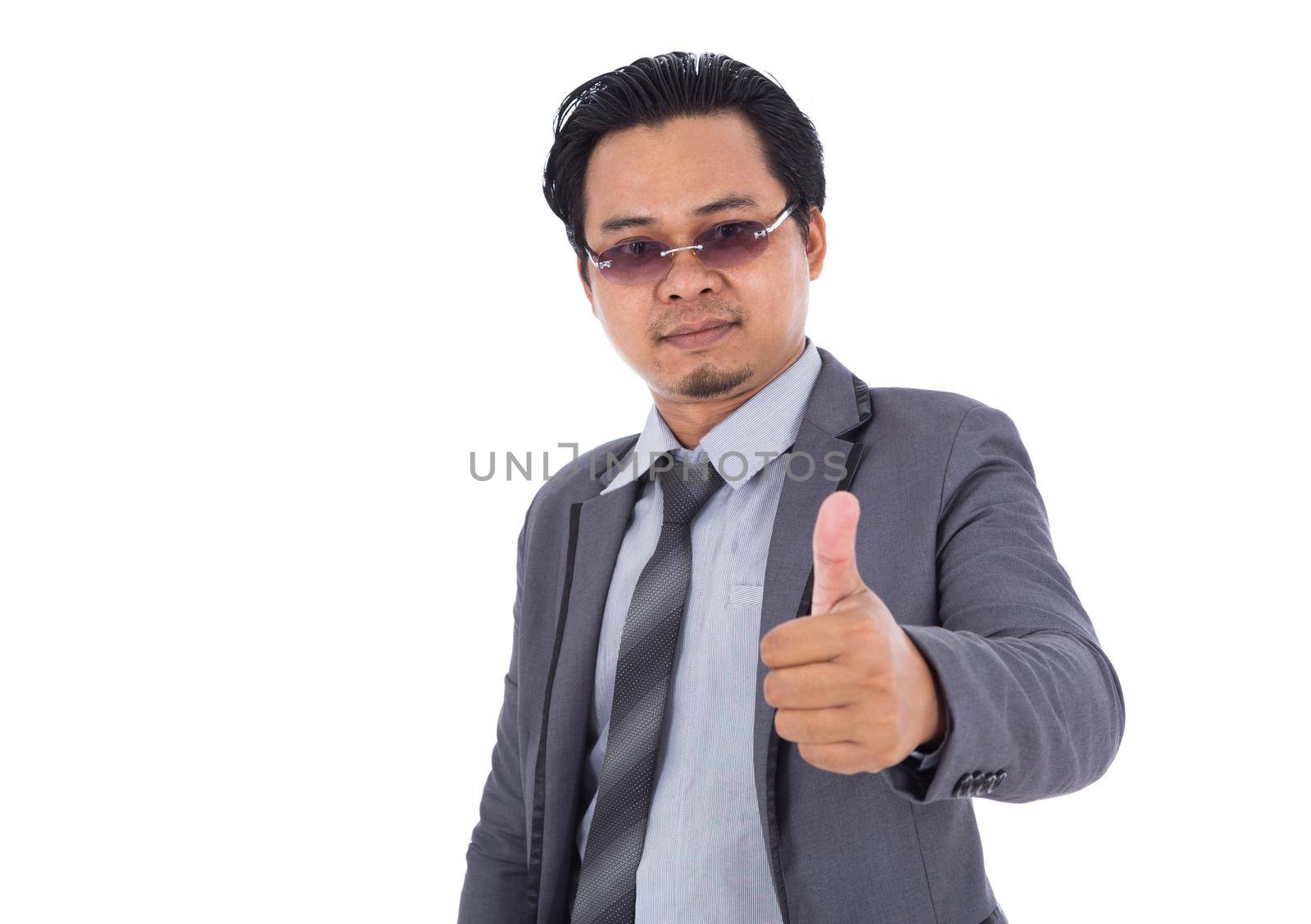 business man in suit with thumb up isolated on white background by geargodz