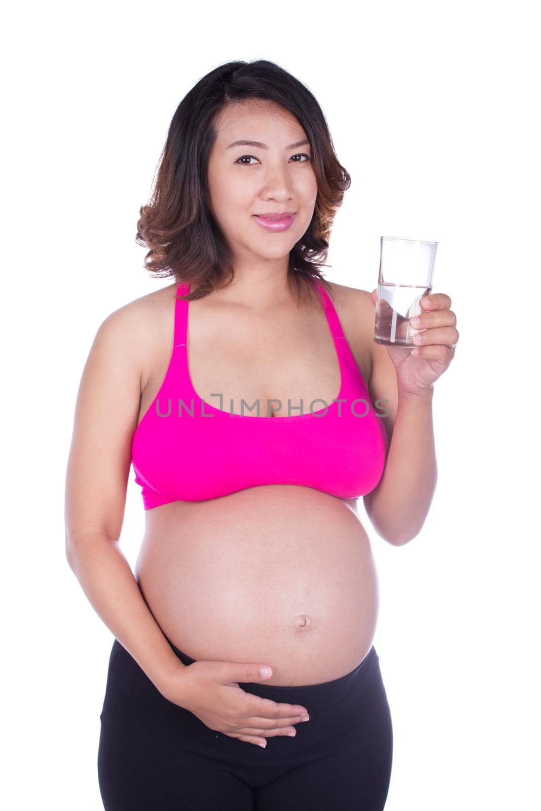 pregnant woman with a glass of water on white background by geargodz