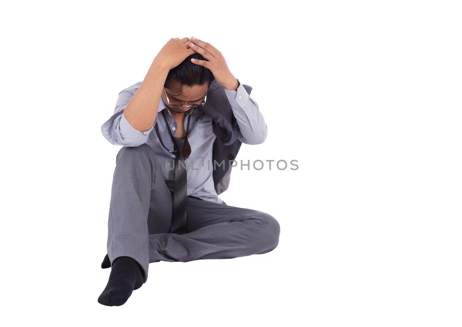 stressed businessman touching his head and thinking isolated on white background