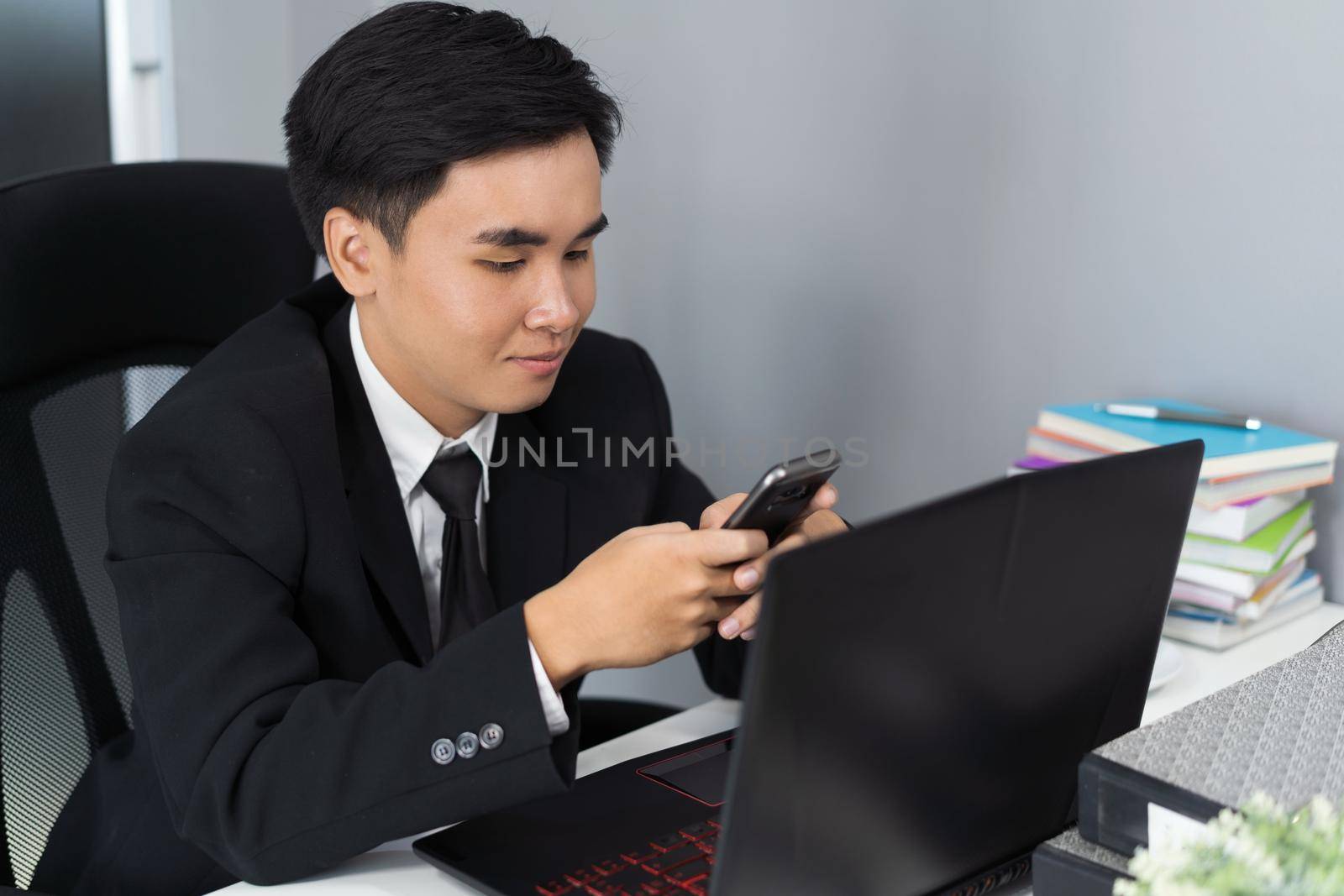 young business man using a smartphone 