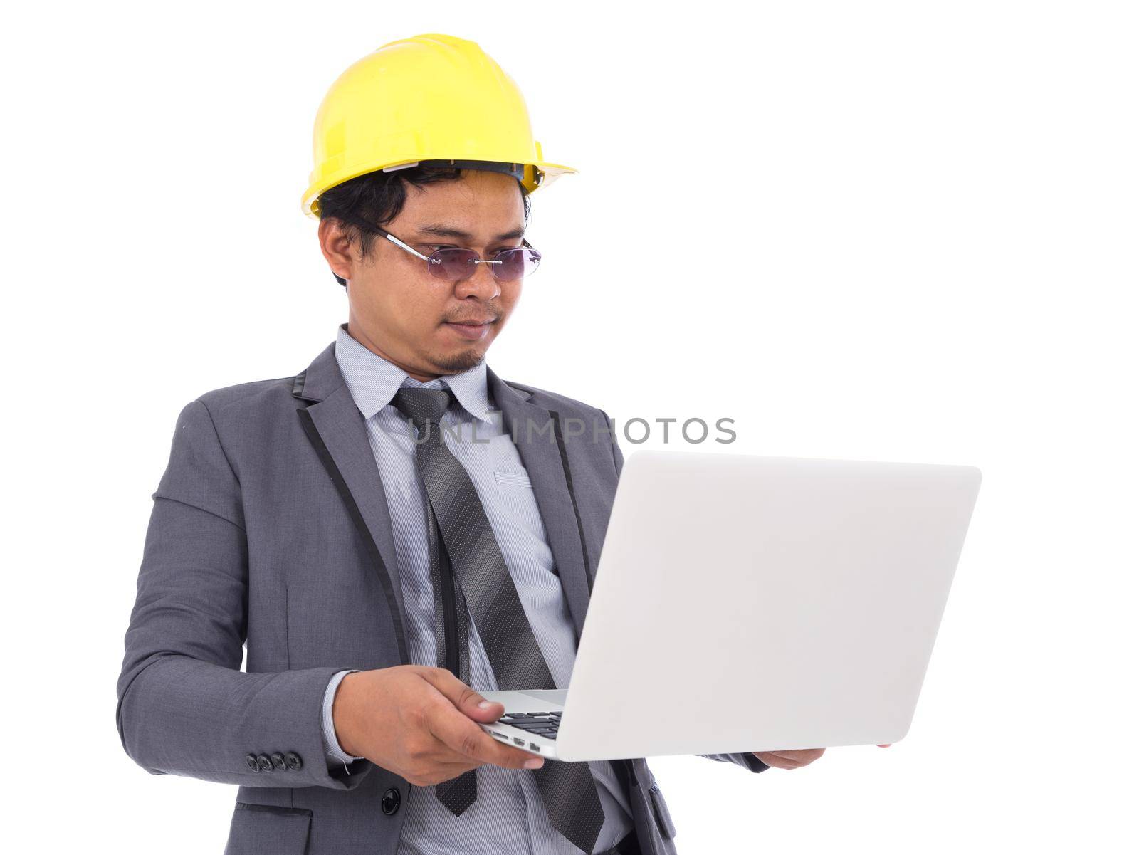 engineer using laptop isolated on a white background