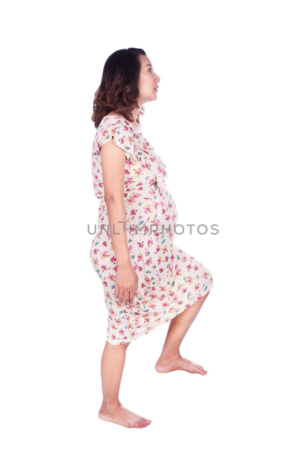 pregnant woman stepping on imaginary step isolted on white by geargodz