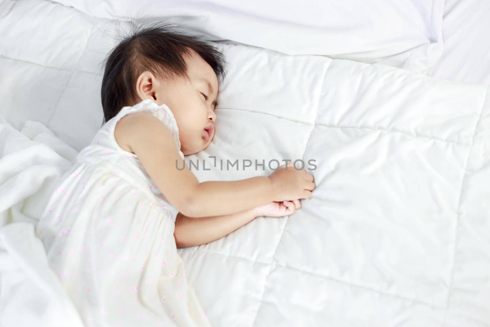 baby sleeping on bed at home by geargodz