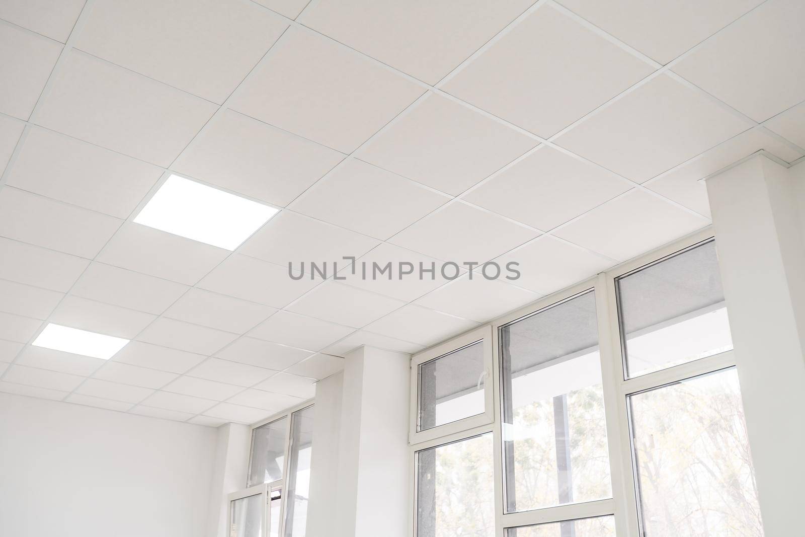 Acoustic ceiling with lighting and light channel window, Acoustic ceiling board texture Sound-proof material, Sound absorber, industry construction concept background black and white tone by Andelov13
