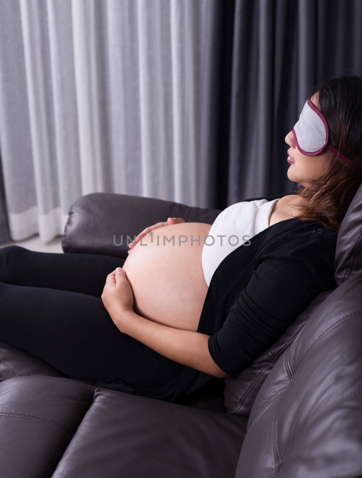 Pregnant woman sleeping on sofa by geargodz
