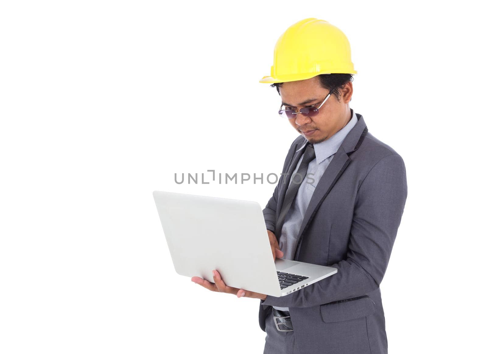 engineer using laptop isolated on white background by geargodz