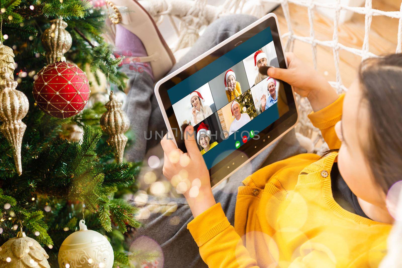 Virtual Christmas meeting team teleworking. Family video call remote conference Computer webcam screen view. Diverse portrait headshots meet working from their home offices. Happy hour party online. by Andelov13