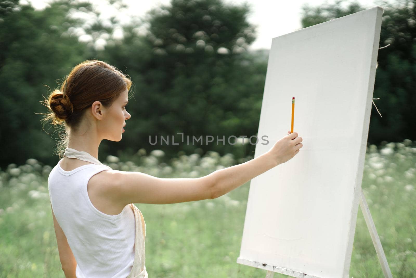 woman artist creative drawing landscape nature hobby. High quality photo