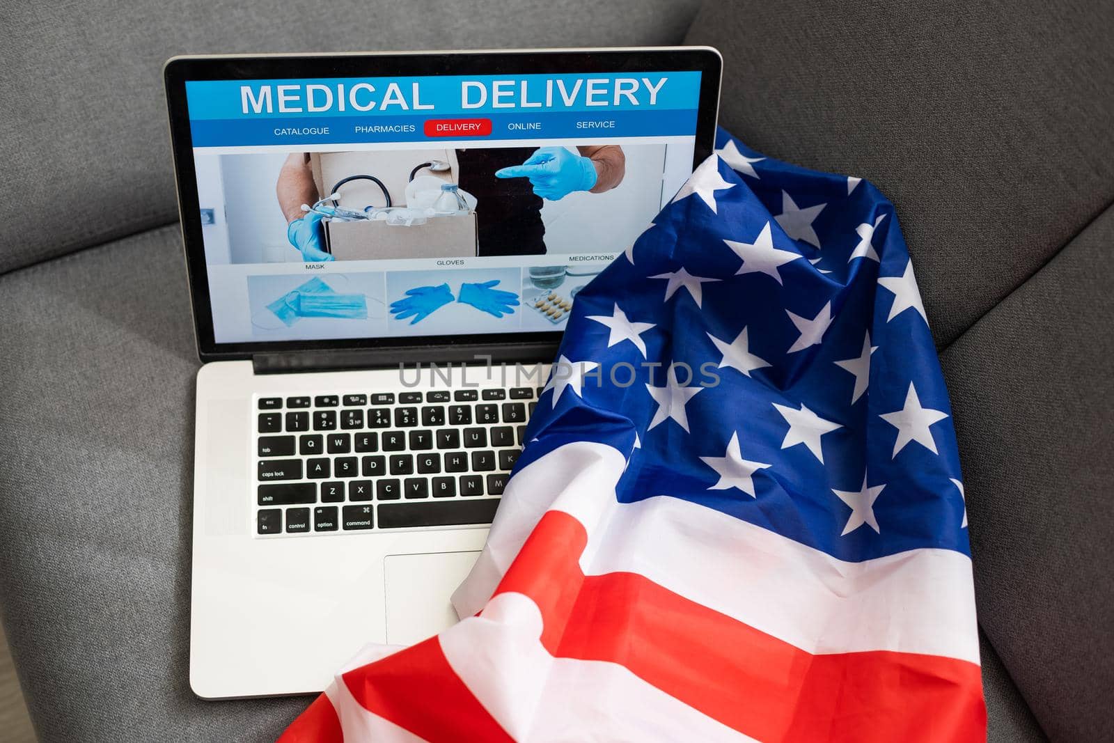 Medical service concept. Laptop and stethoscope on USA flag background