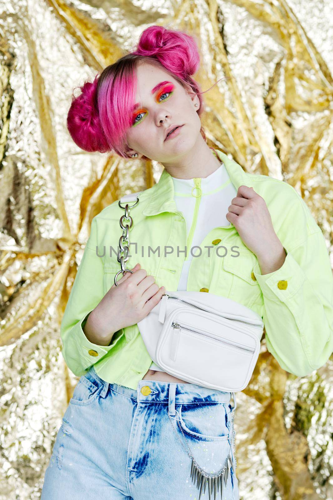 pretty woman pink hair posing fashion studio. High quality photo