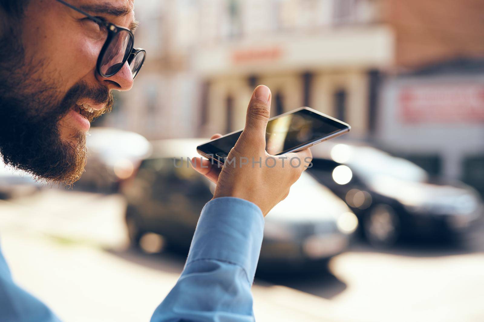 business man with phone outdoors communication lifestyle. High quality photo