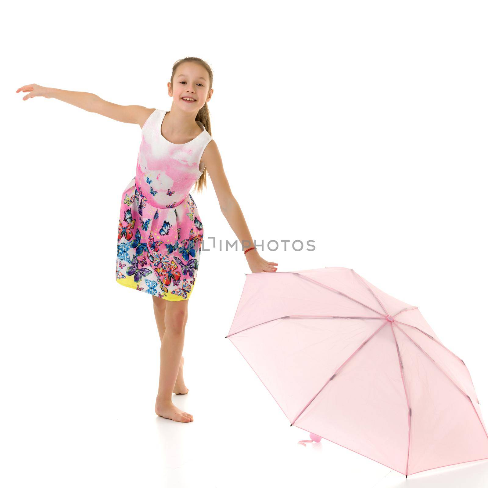 Little girl with umbrella.Concept style and fashion. Isolated on white background. by kolesnikov_studio