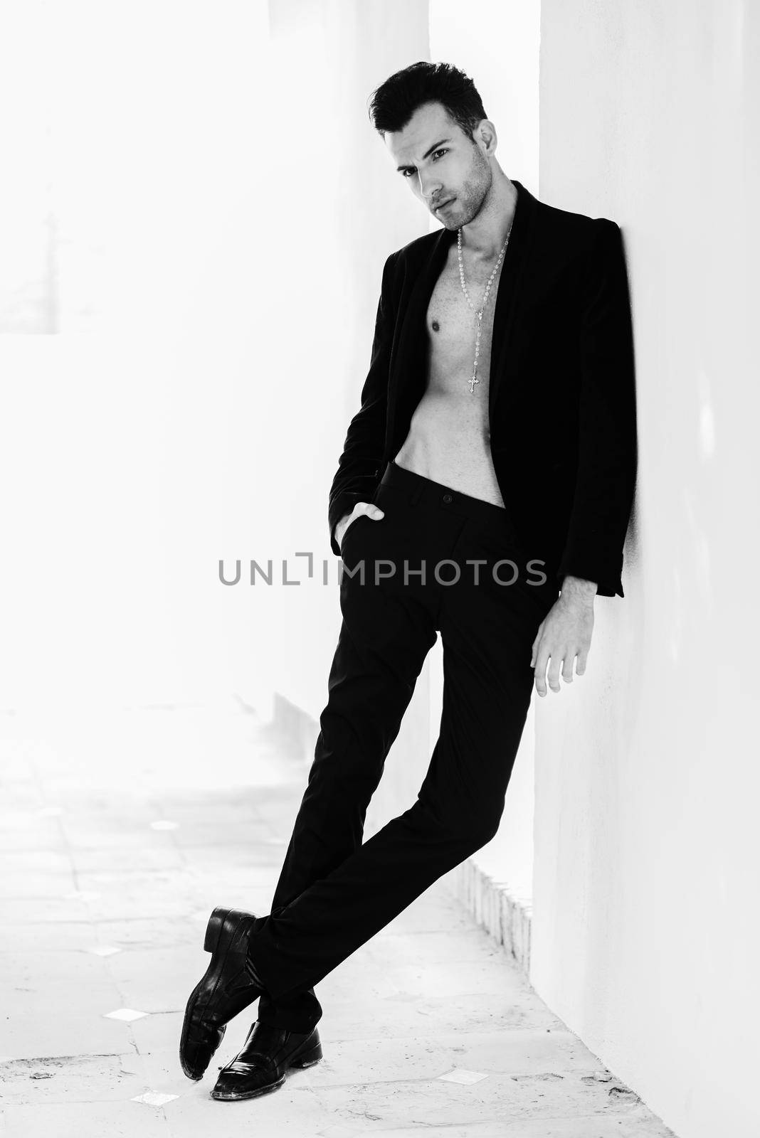 Portrait of attractive man, model of fashion, wearing spanish clothes