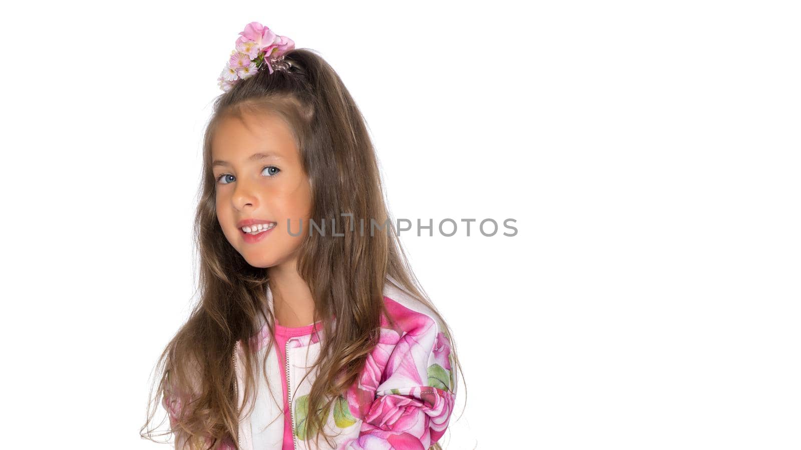 Beautiful little girl close-up. The concept of beauty and fashion, happy childhood. Isolated on white background.