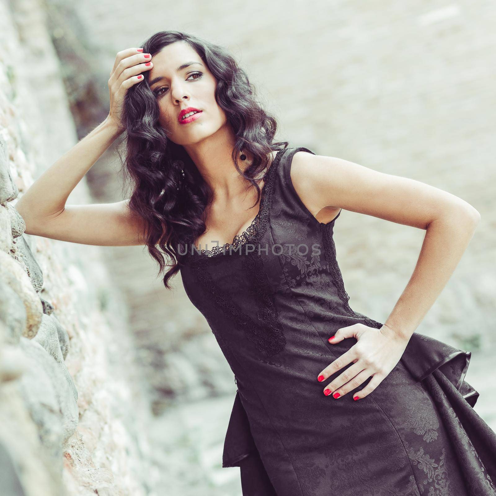 Woman, model of fashion, wearing black dress with curly hair by javiindy
