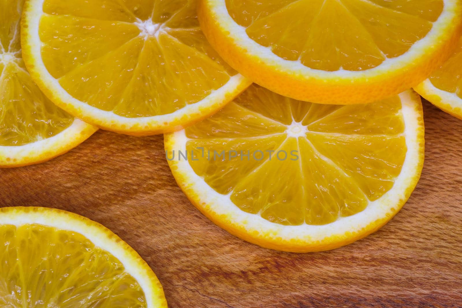 Fresh Valencia Orange Fruit Slices Abstract Layout On Wood (Citrus × sinensis) by jjvanginkel