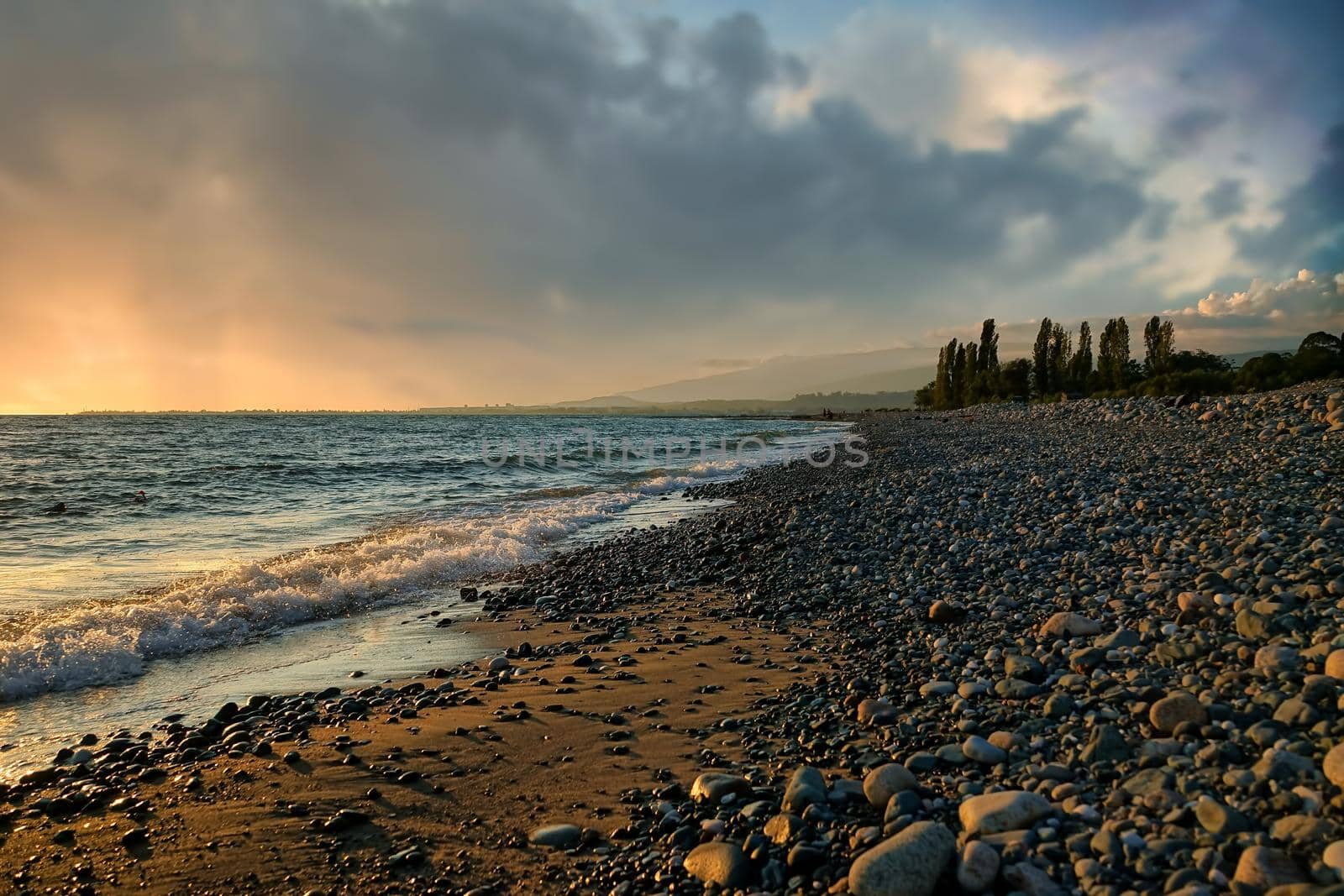 seascape with a beautiful sunset on the background of the sea.