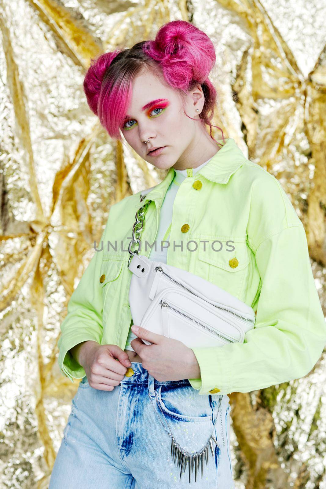 glamorous fashionable woman with pink hair posing hipster neon. High quality photo