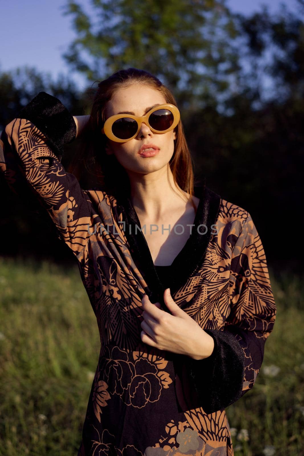 fashionable woman in sunglasses outdoors summer glamor. High quality photo