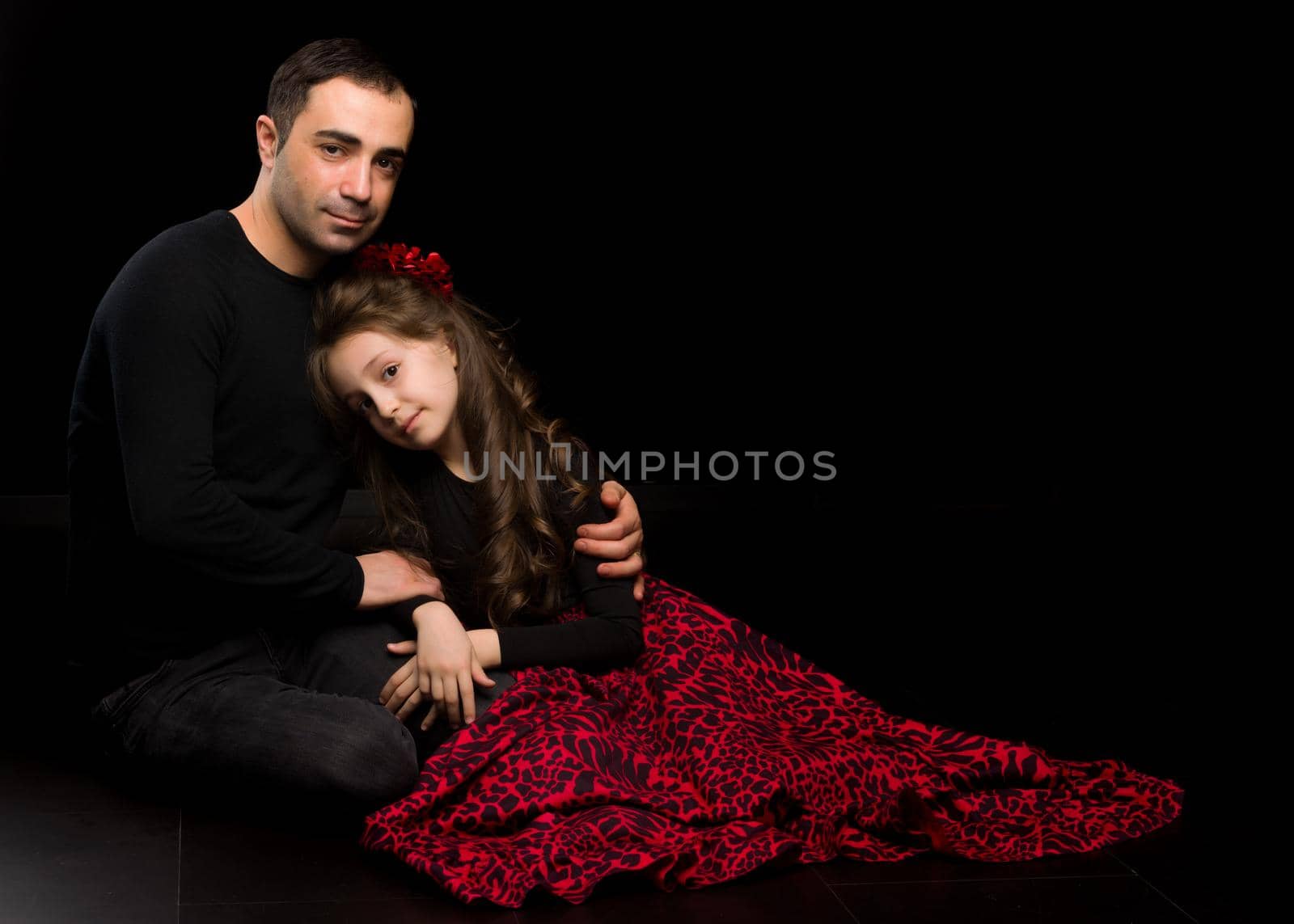 Portrait of Loving Father Hugging His Beautiful Daughter by kolesnikov_studio