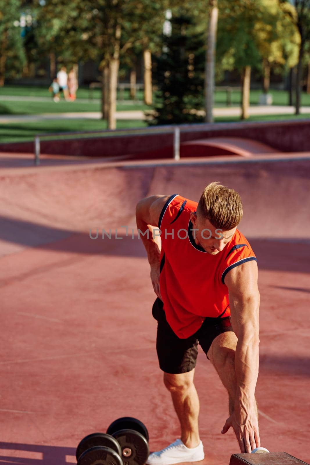 sporty man workout outdoors playground lifestyle. High quality photo