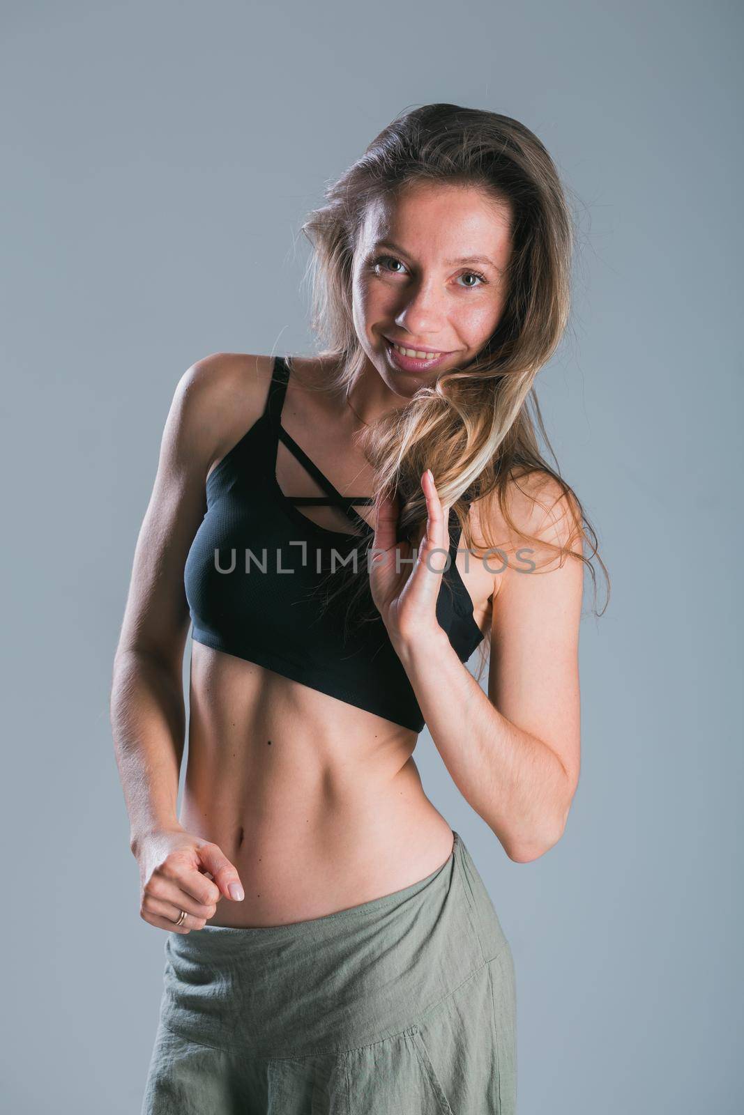 Portrait of young slim fitness woman. Sport and healthy lifestyle concept