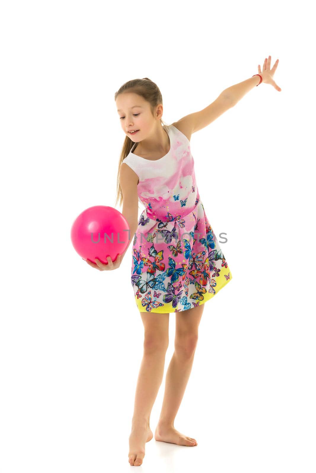 little girl is engaged in fitness with a ball. by kolesnikov_studio