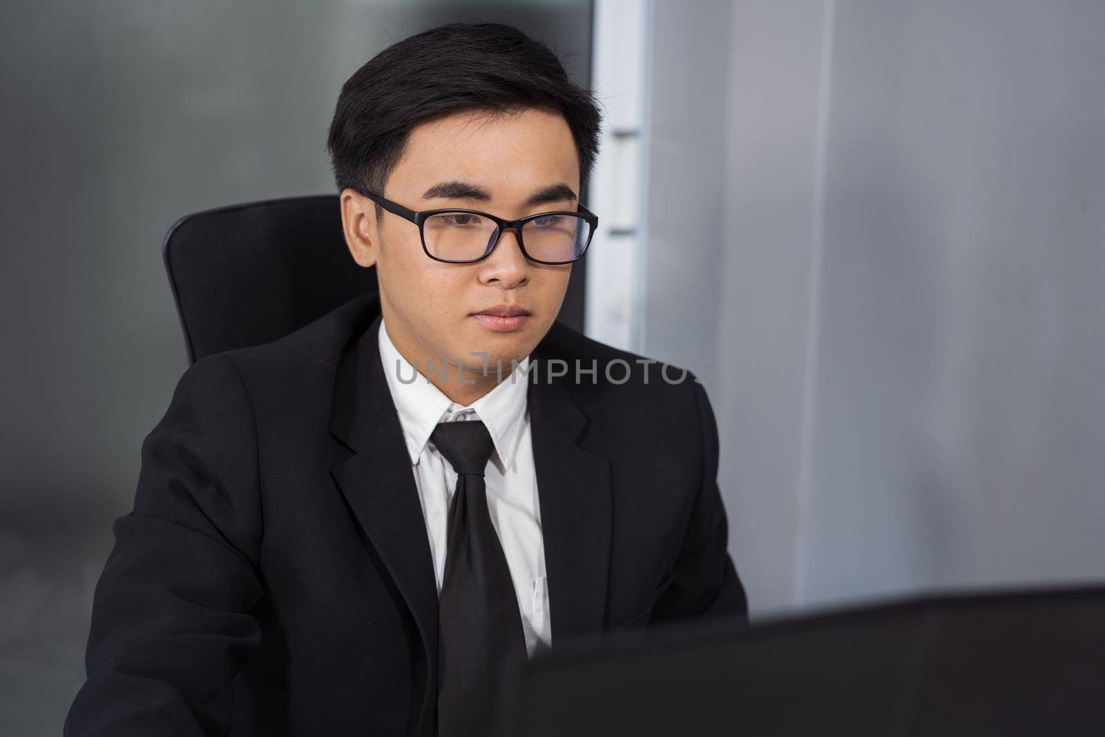 business man using laptop computer by geargodz