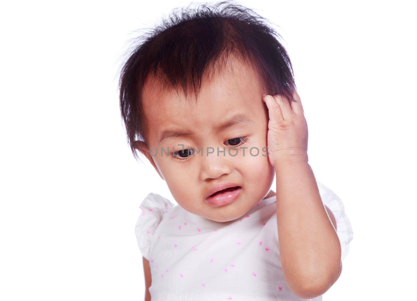 sad baby in depression tearing hair on head isolated on white background by geargodz
