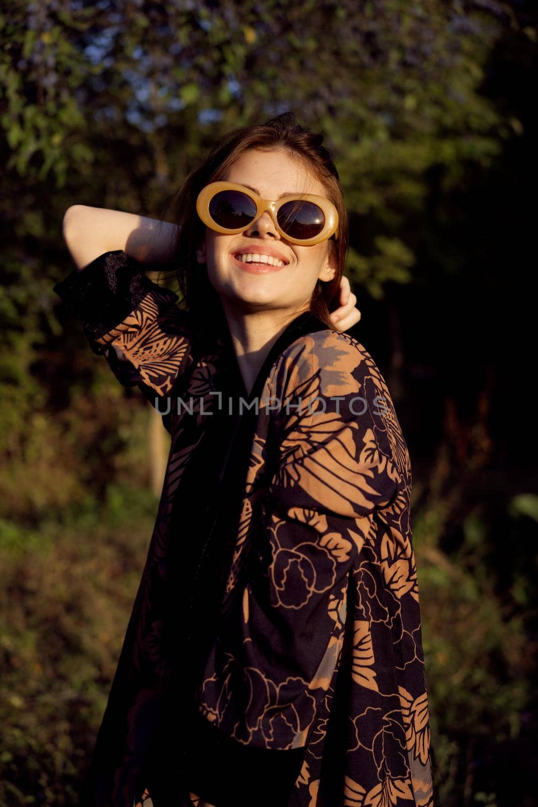 woman wearing sunglasses outdoors posing fashion glamor by Vichizh