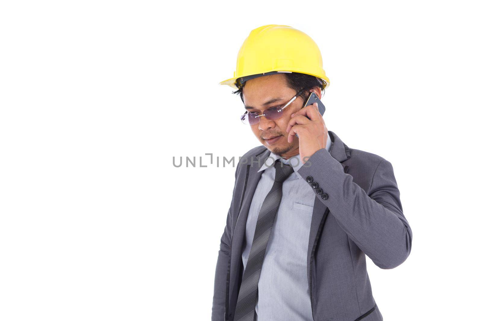 engineer using mobile phone isolated on white background by geargodz